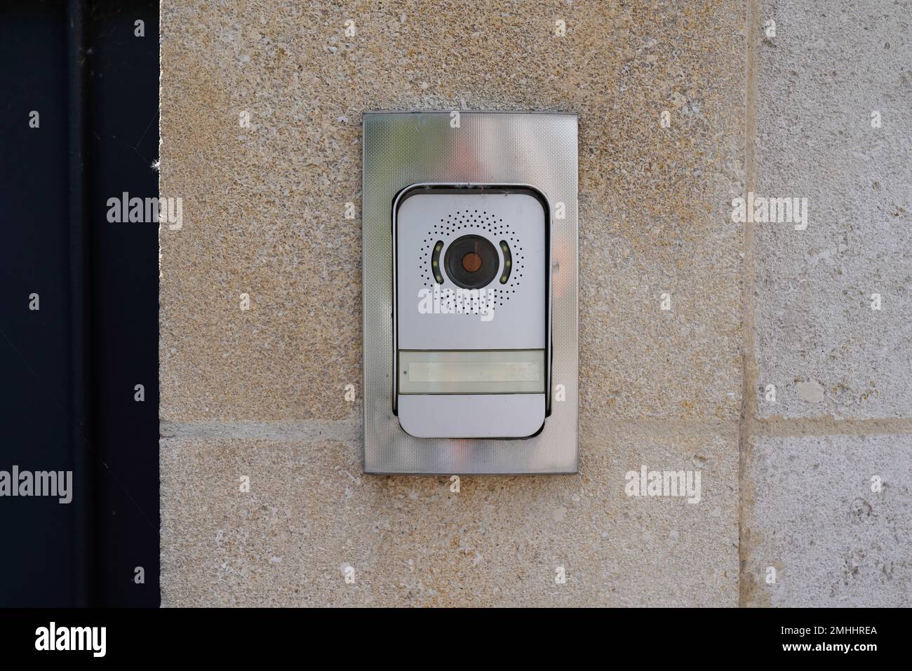 Ring surveillance video on modern house with contemporary doorbell near