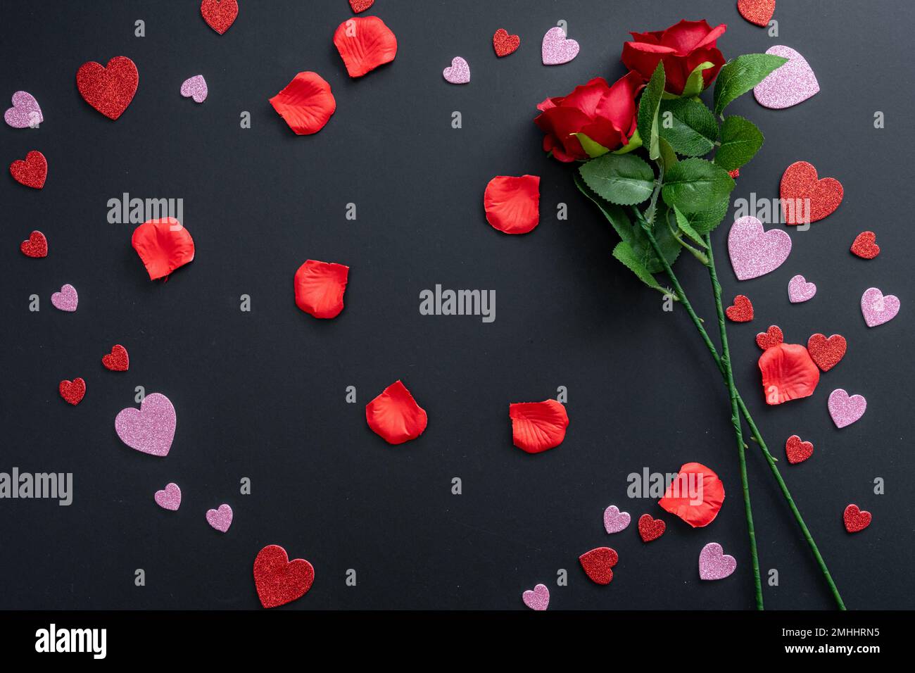 Beautiful Valentine's Day background with red hearts and red roses on ...