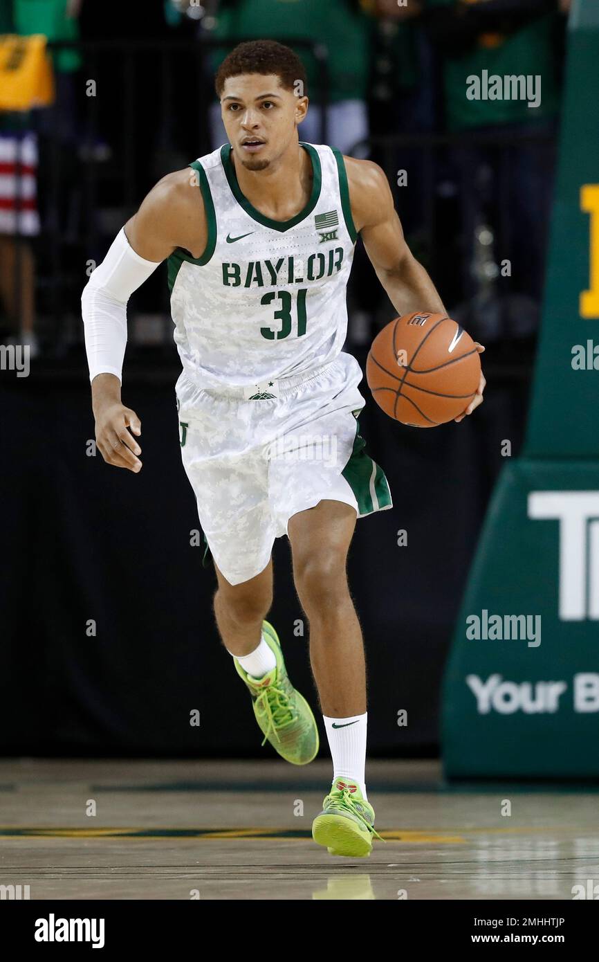 Baylor guard MaCio Teague advances the ball up court during an NCAA