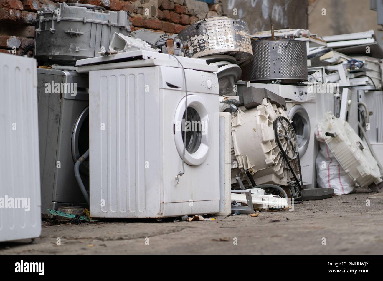 Old washing machines and other broken home appliance at local scrap yard Stock Photo Alamy