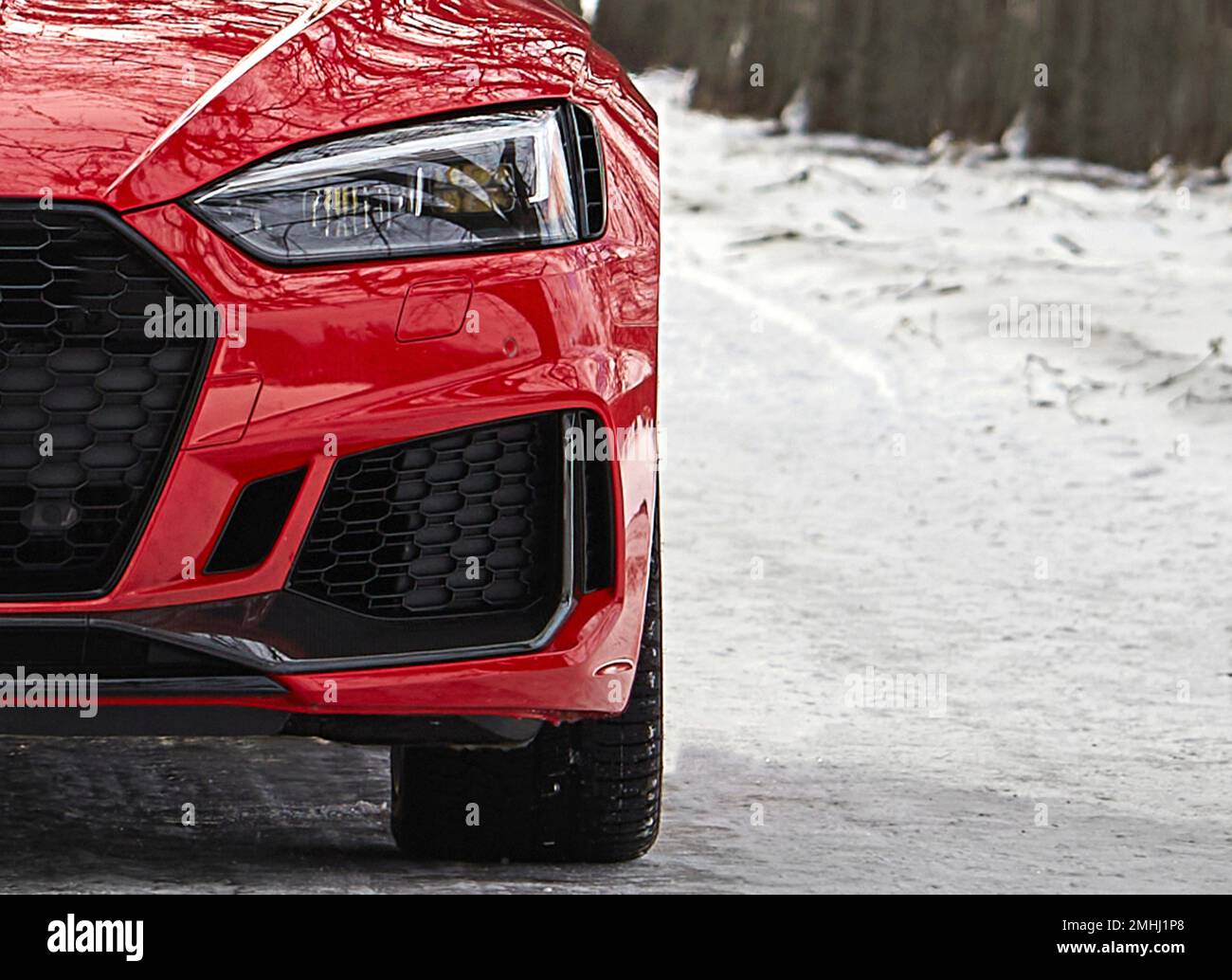 Modern red car lights, sportcar driving on the road, city car photo