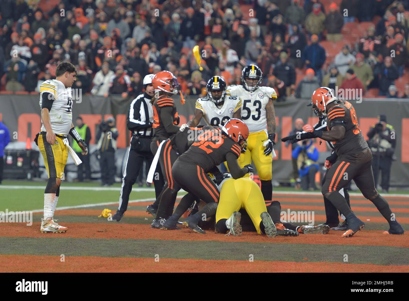 Cleveland Browns defensive end Myles Garrett (95) pulls the helmet off  Pittsburgh Steelers quarterback Mason Rudolph (2) in the fourth quarter of  an NFL football game, Thursday, Nov. 14, 2019, in Cleveland.