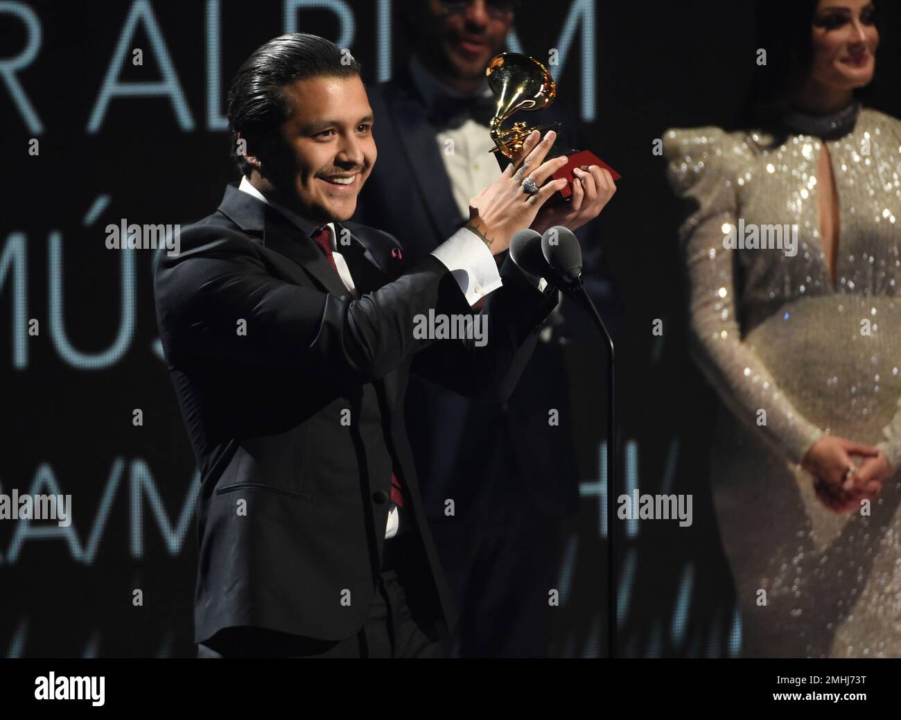 Christian Nodal accepts the award for best ranchero/mariachi album for ...