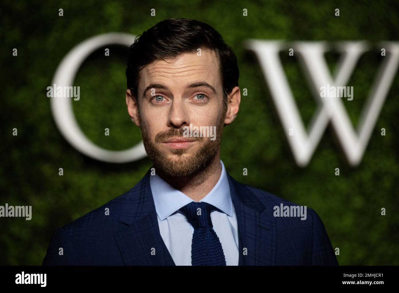 Harry Treadaway poses for photographers upon arrival at the World