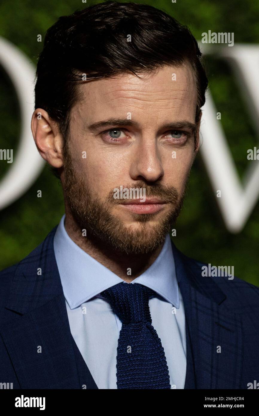 Harry Treadaway poses for photographers upon arrival at the World