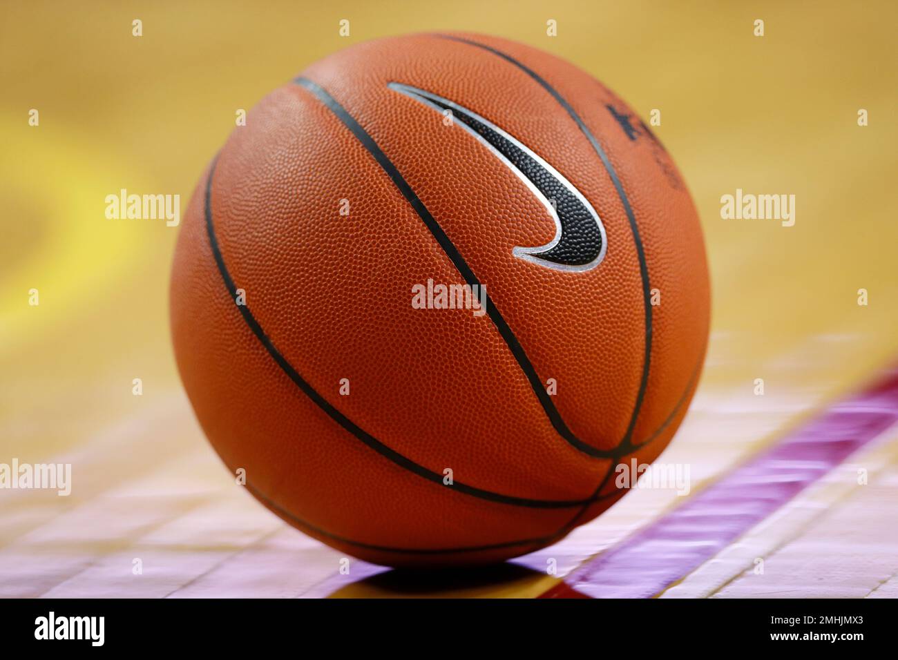 A basketball sits on the court during the first half of an NCAA college ...