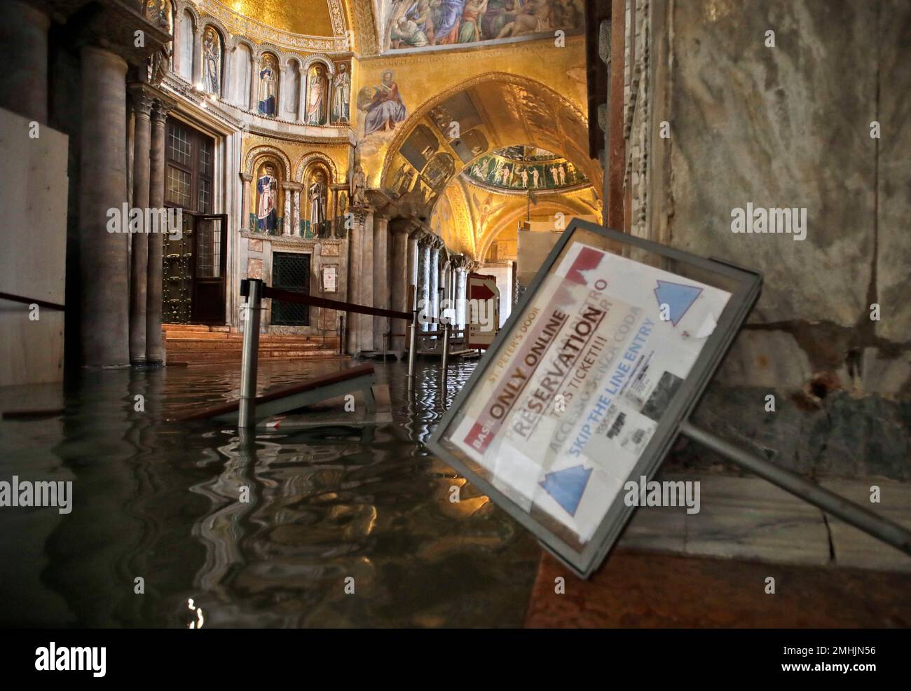 High water floods the inside of St. Mark's Basilica, in Venice, Wednesday,  Nov. 13, 2019. The high-water mark hit 187 centimeters (74 inches) late  Tuesday, Nov. 12, 2019, meaning more than 85%