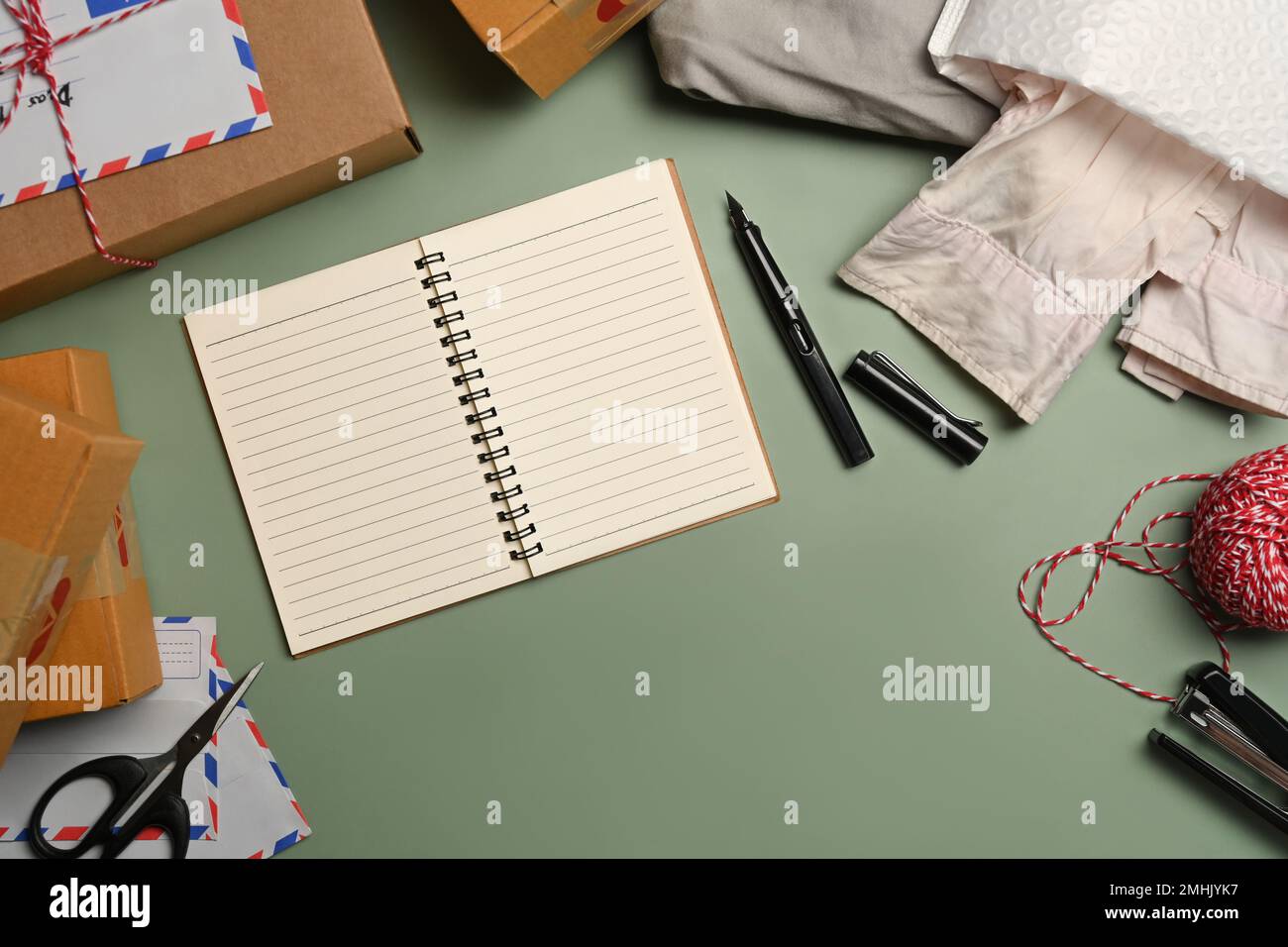 Wrapping paper, adhesive tape and scissors Stock Photo - Alamy