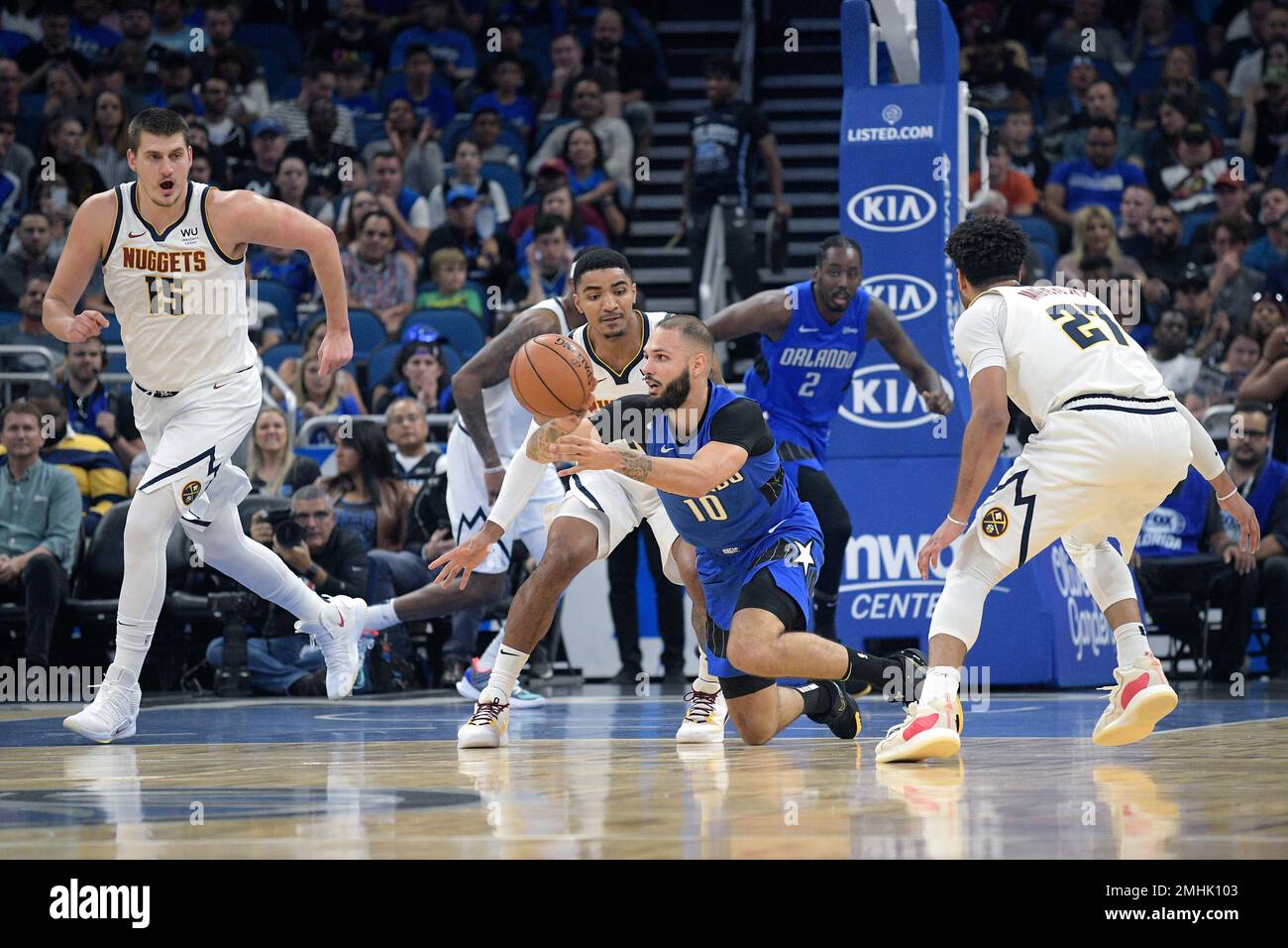 Orlando Magic guard Evan Fournier (10) passes after gaining control of
