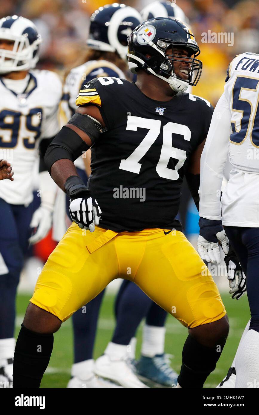 Pittsburgh Steelers offensive tackle Chukwuma Okorafor (76) plays during the first half of an NFL football game against the Los Angeles Rams in Pittsburgh, Sunday, Nov