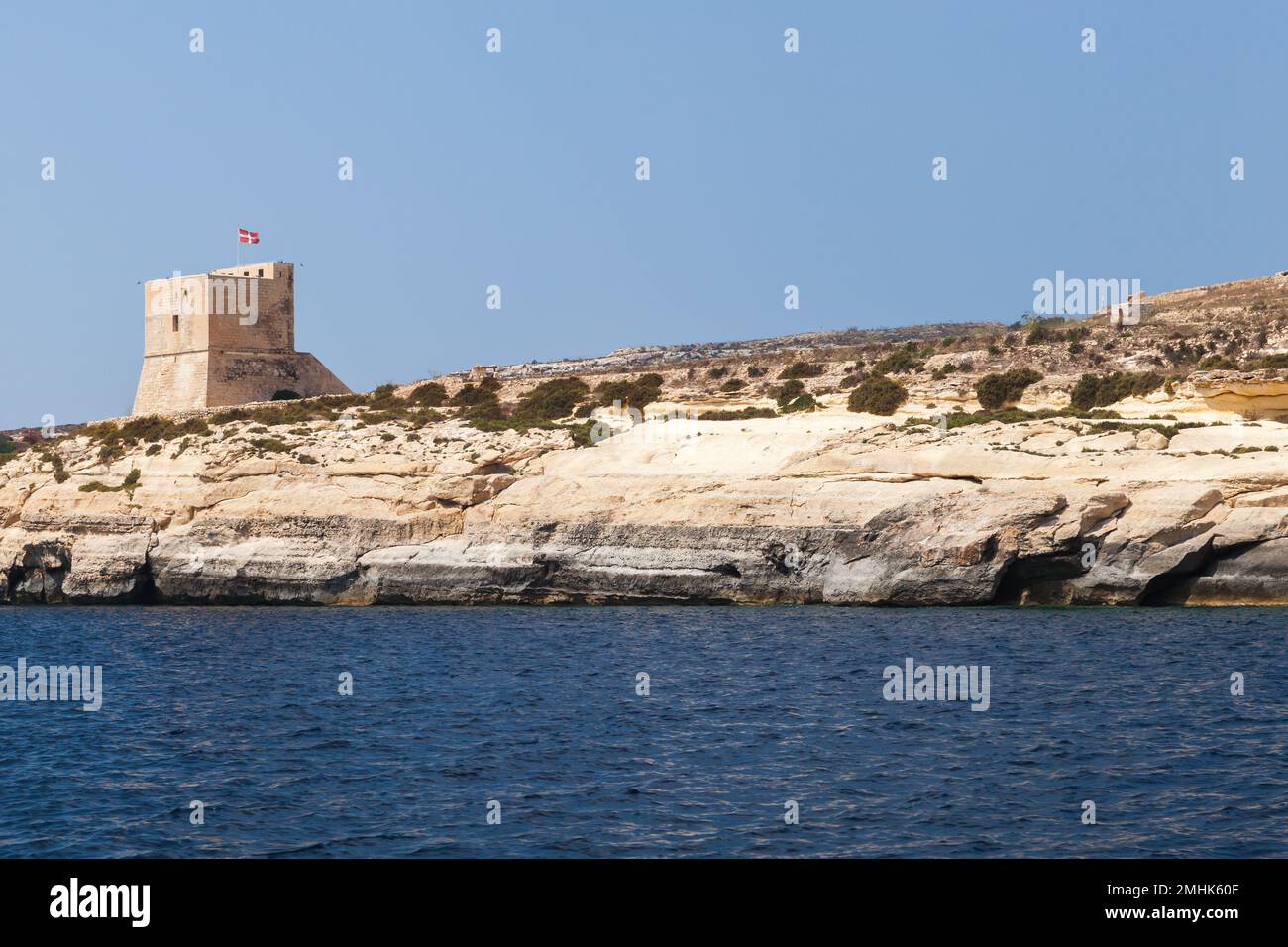 Gozo island coastal landscape with Mgarr ix-Xini Tower, the largest of the coastal watchtowers that the Knights of Malta Stock Photo