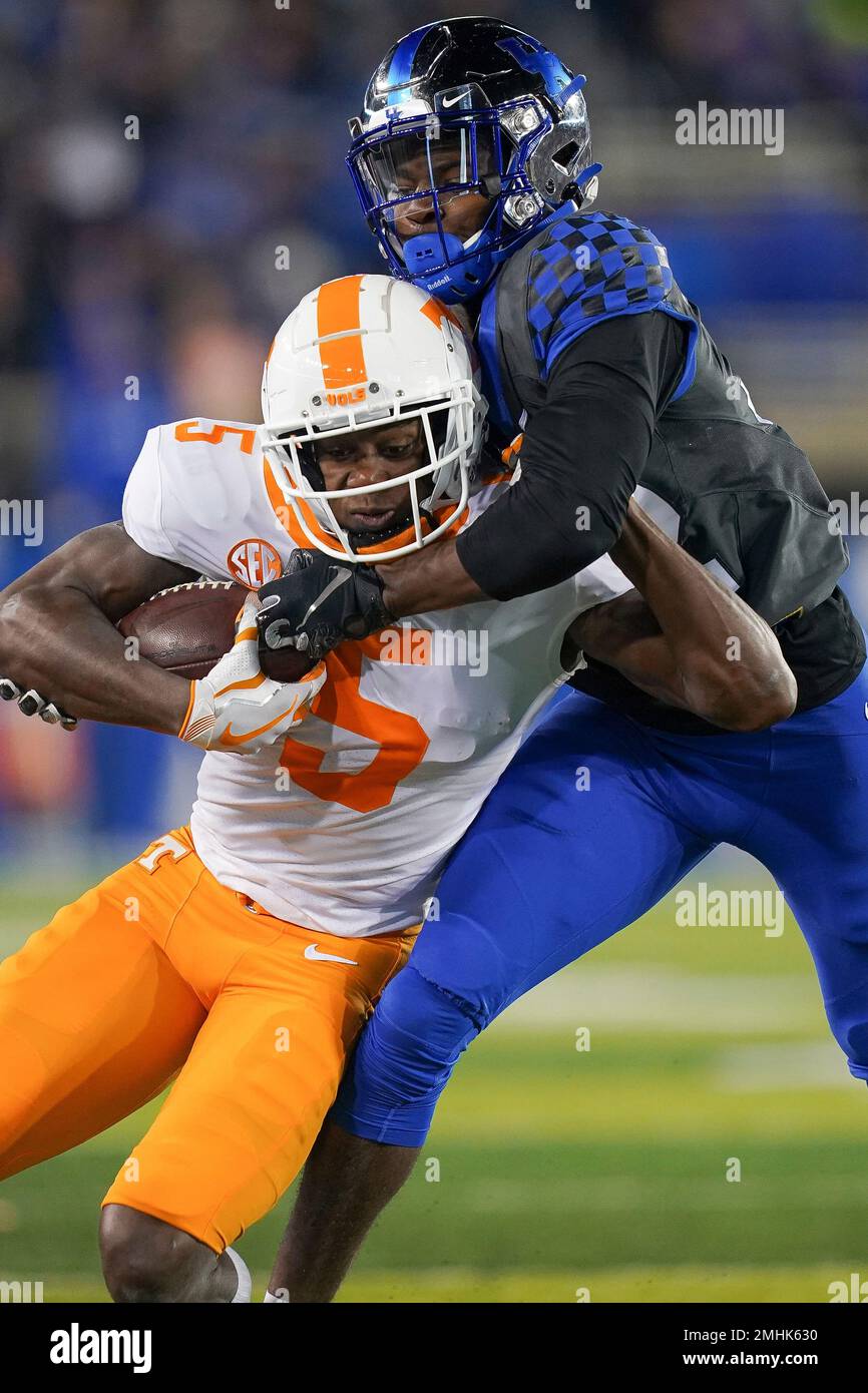 Tennessee wide receiver Josh Palmer (5) is tackled by Kentucky