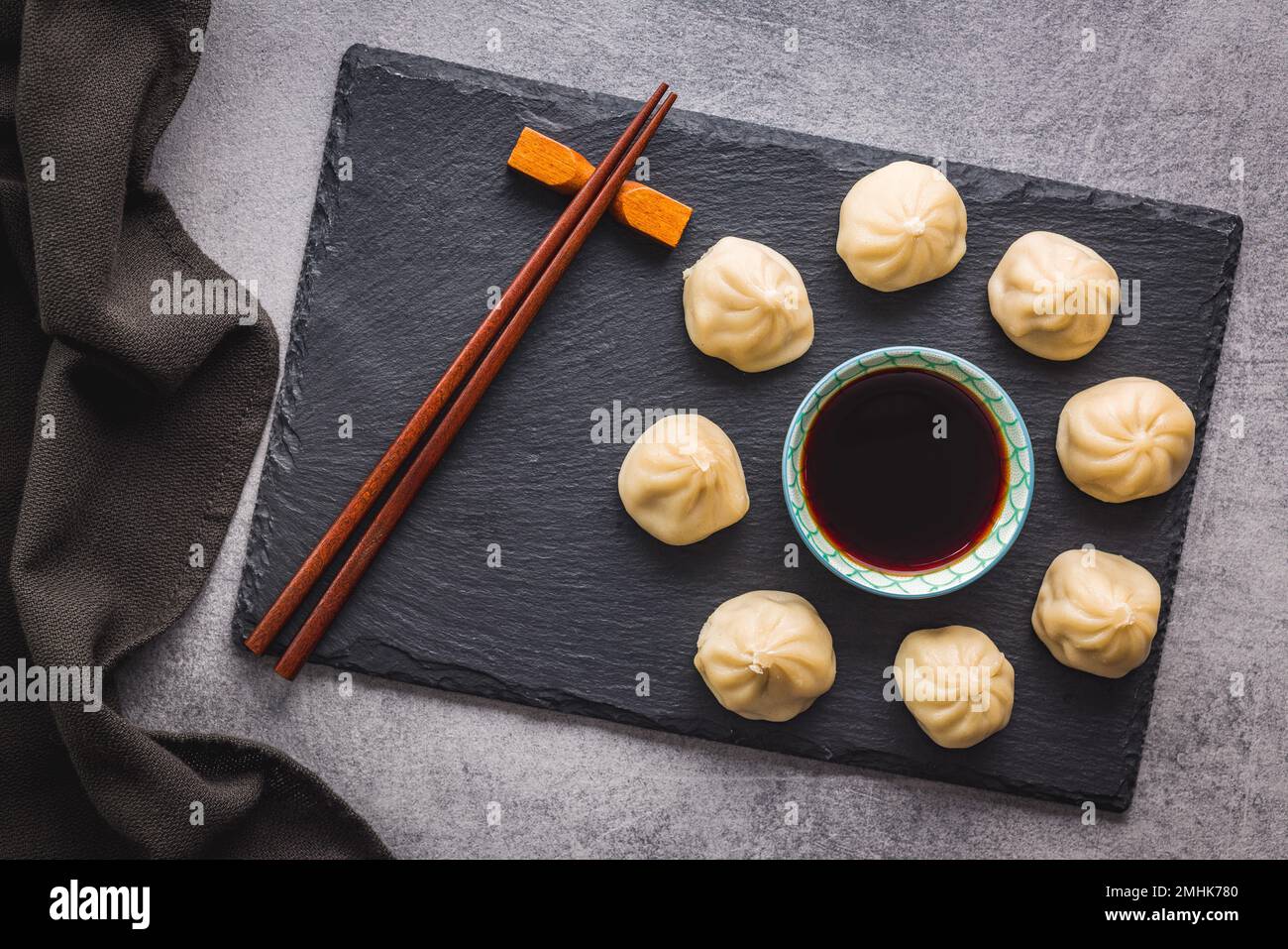 Xiaolongbao, traditional steamed dumplings and soy sauce. Xiao Long Bao