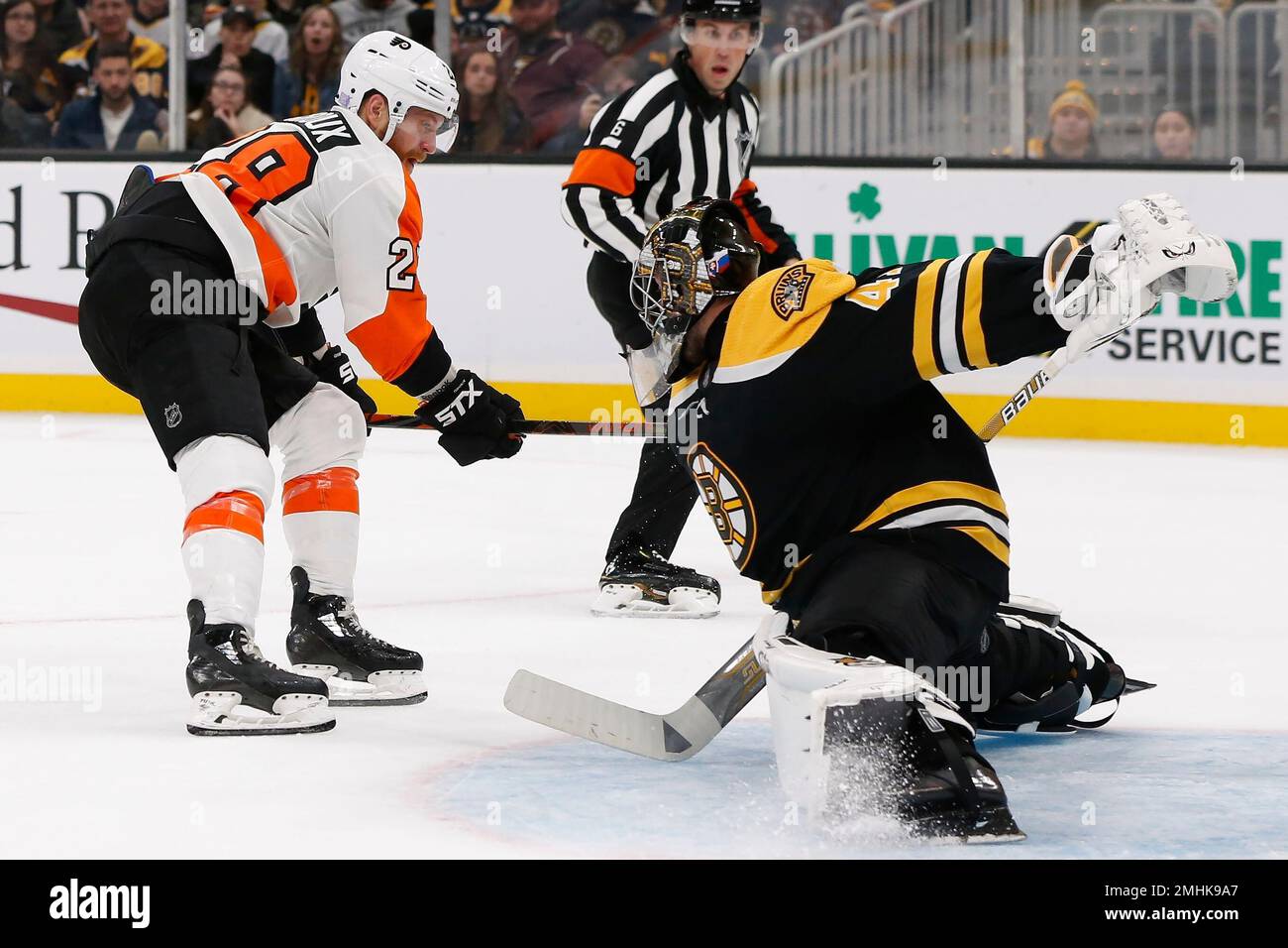Boston Bruins' Jaroslav Halak (41) blocks a shot by Philadelphia Flyers