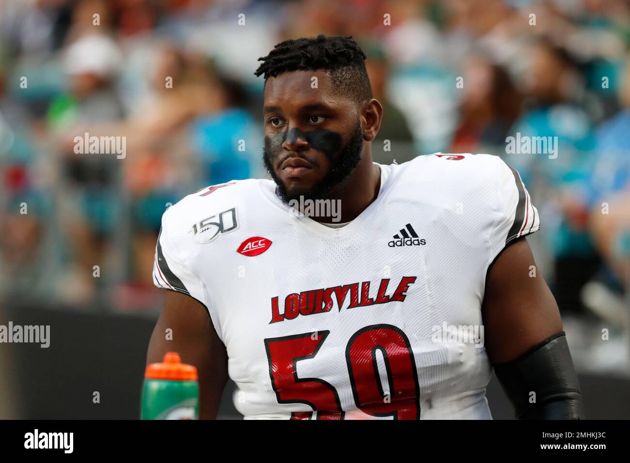 Louisville offensive lineman T.J. McCoy 59 looks on during