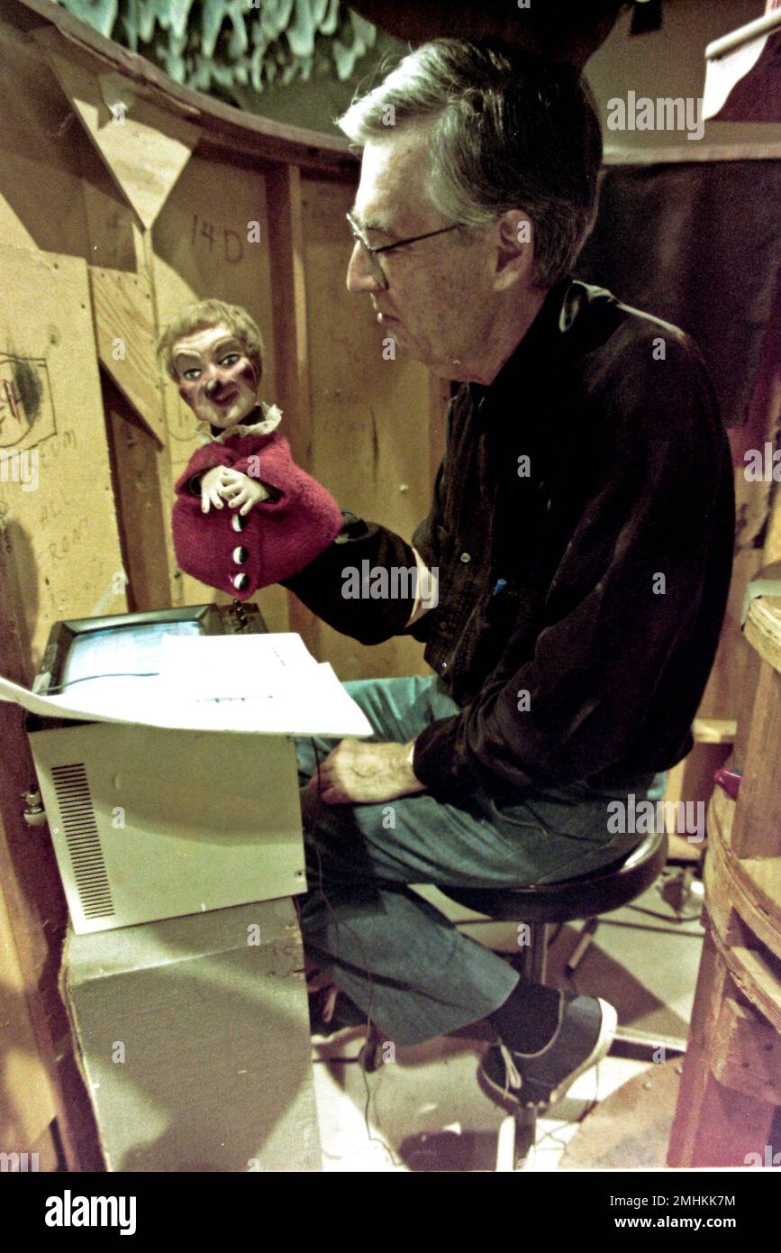 This June 27, 1993 file photo shows Fred Rogers working with Lady