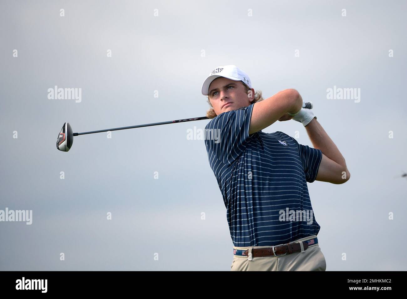 North Florida golfer Davis Lee tees off on the ninth hole during an ...