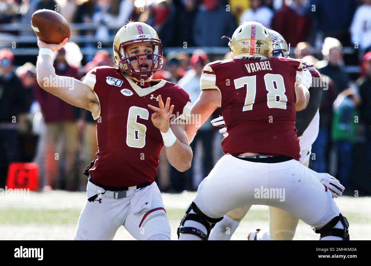Boston College quarterback Dennis Grosel (6) recovers a fumble as