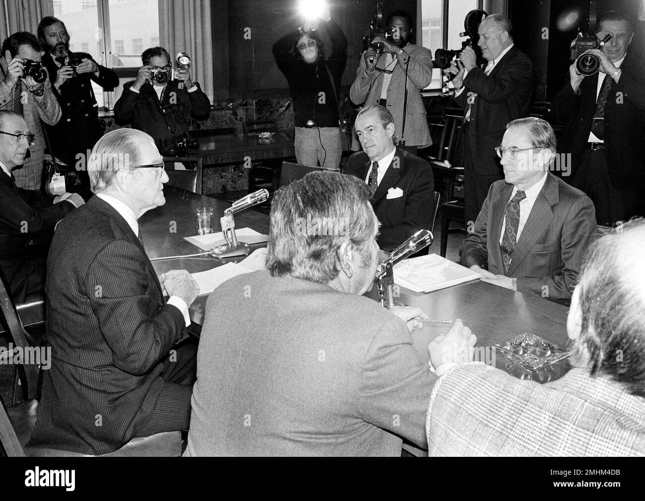 CIA director William Colby, upper right, and former director Richard ...