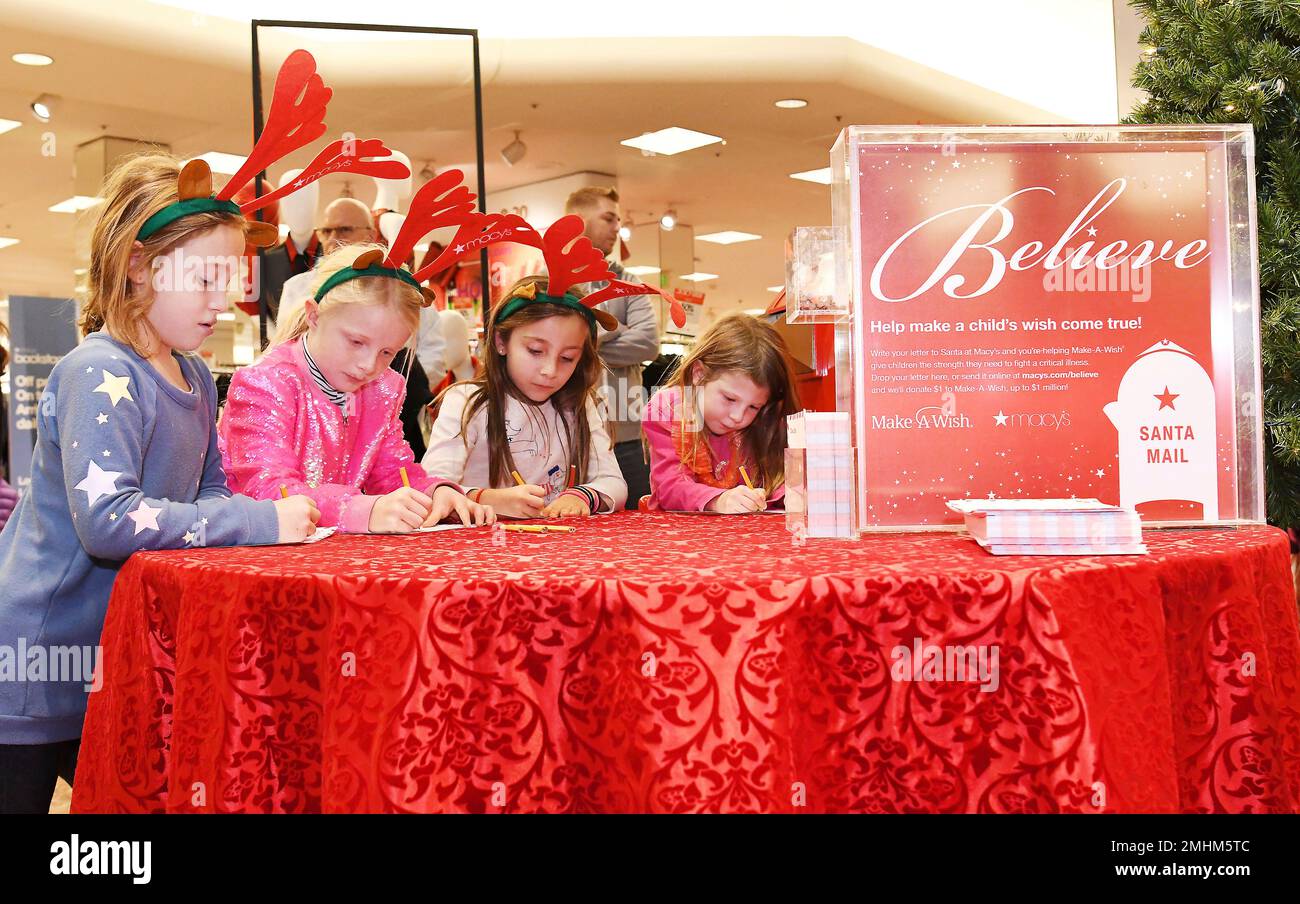IMAGE DISTRIBUTED FOR MACY'S - Children write letters to Santa at the ...