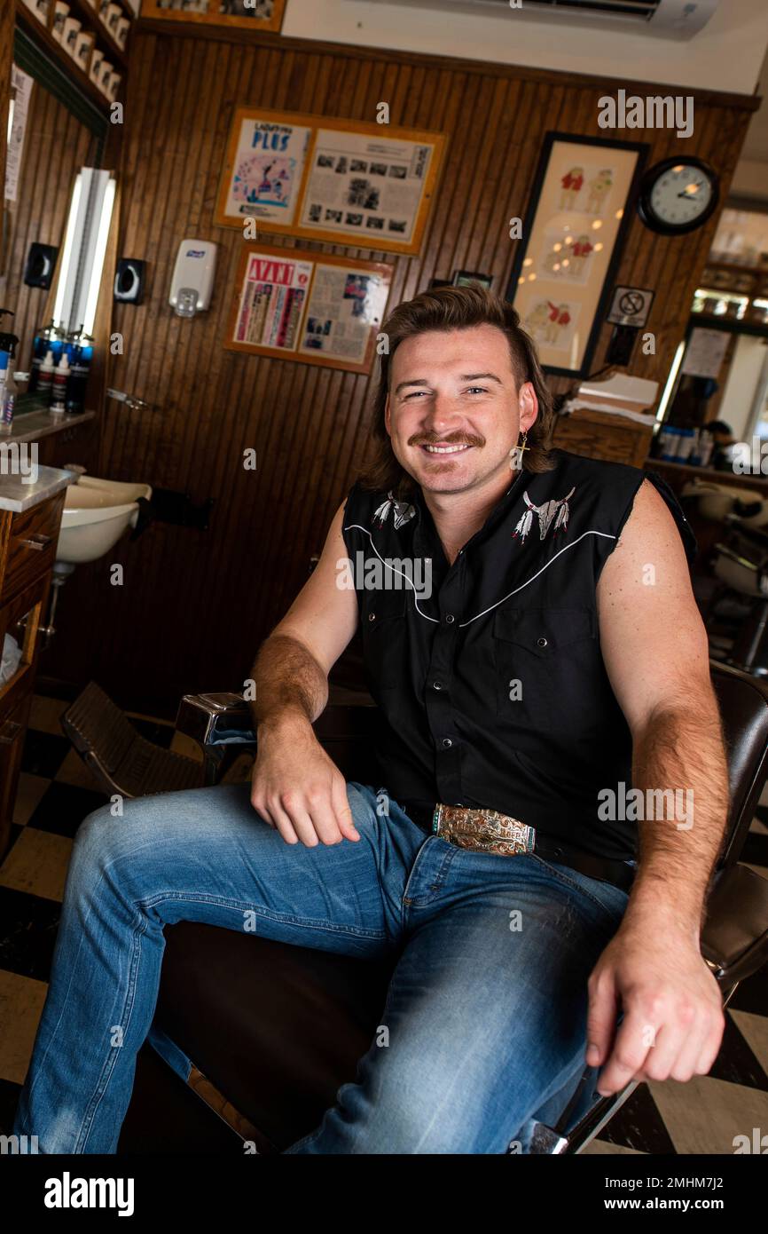 Wallen poses for a portrait after getting a haircut at Paul Mole