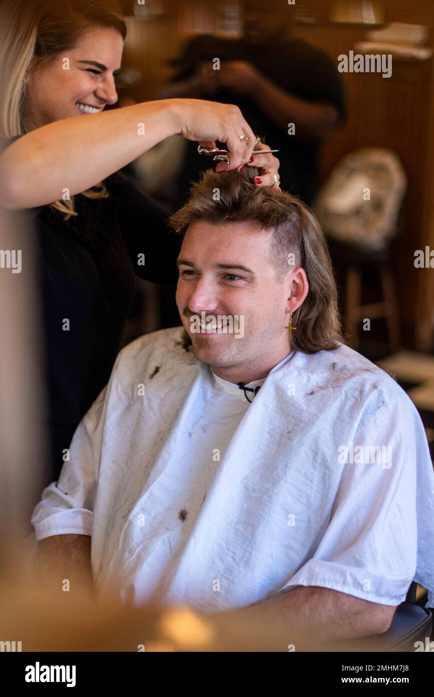 Wallen gets a haircut at Paul Mole Barber Shop on Tuesday, Aug