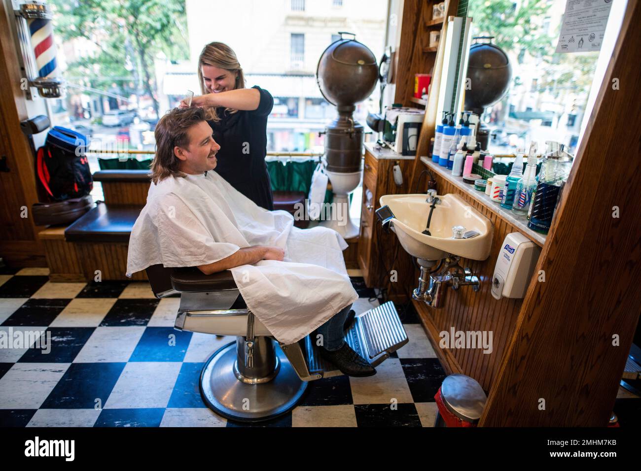 Wallen gets a haircut at Paul Mole Barber Shop on Tuesday, Aug