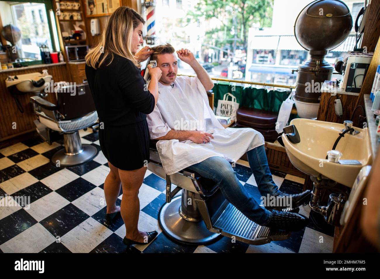 Wallen gets a haircut at Paul Mole Barber Shop on Tuesday, Aug