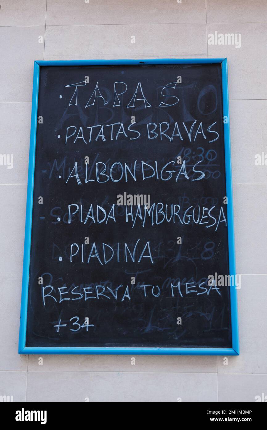 spanish-bar-menu-on-chalkboard-outside-valencian-restaurant-spain