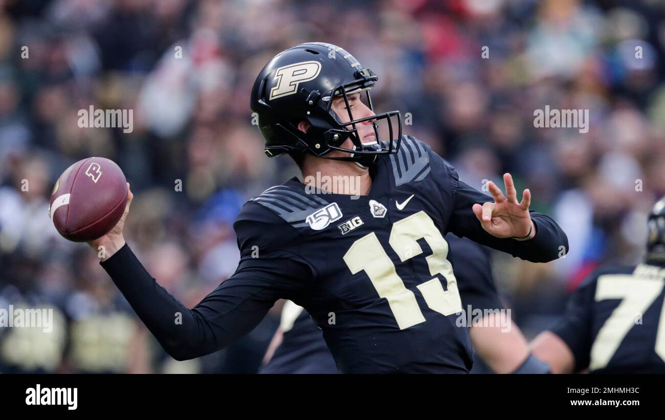 Purdue quarterback Jack Plummer (13) throws against Nebraska during the
