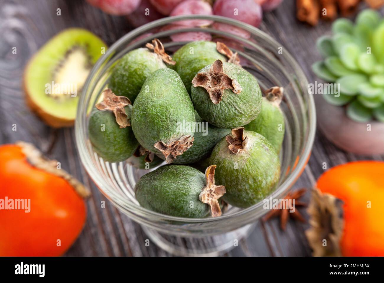 feijoa group on wood background Stock Photo
