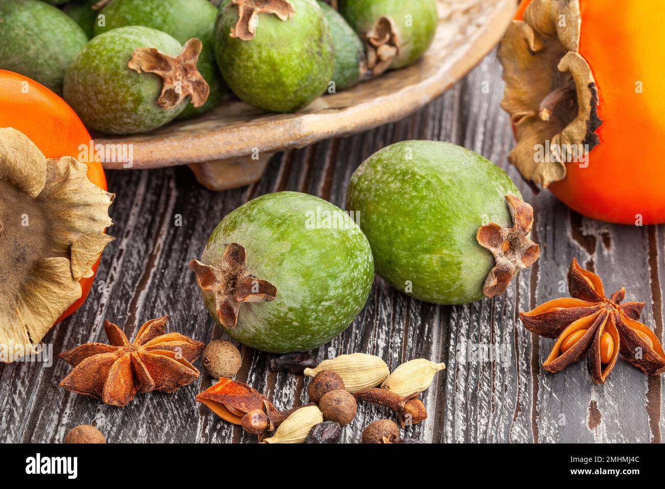 feijoa group on wood background Stock Photo