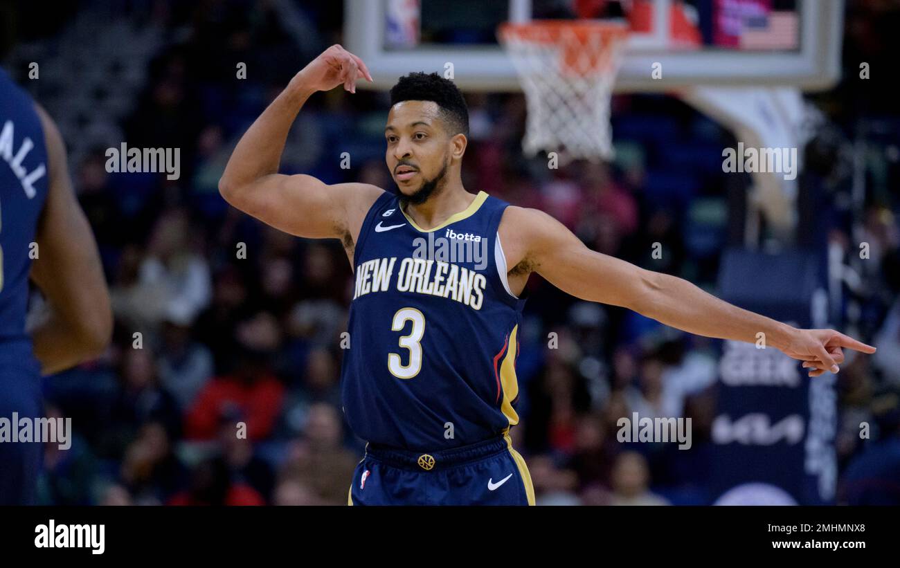 New Orleans Pelicans guard CJ McCollum (3) passes the ball during the  second half of an NBA basketball game against the Orlando Magic, Friday,  Jan. 20, 2023, in Orlando, Fla. (AP Photo/Phelan