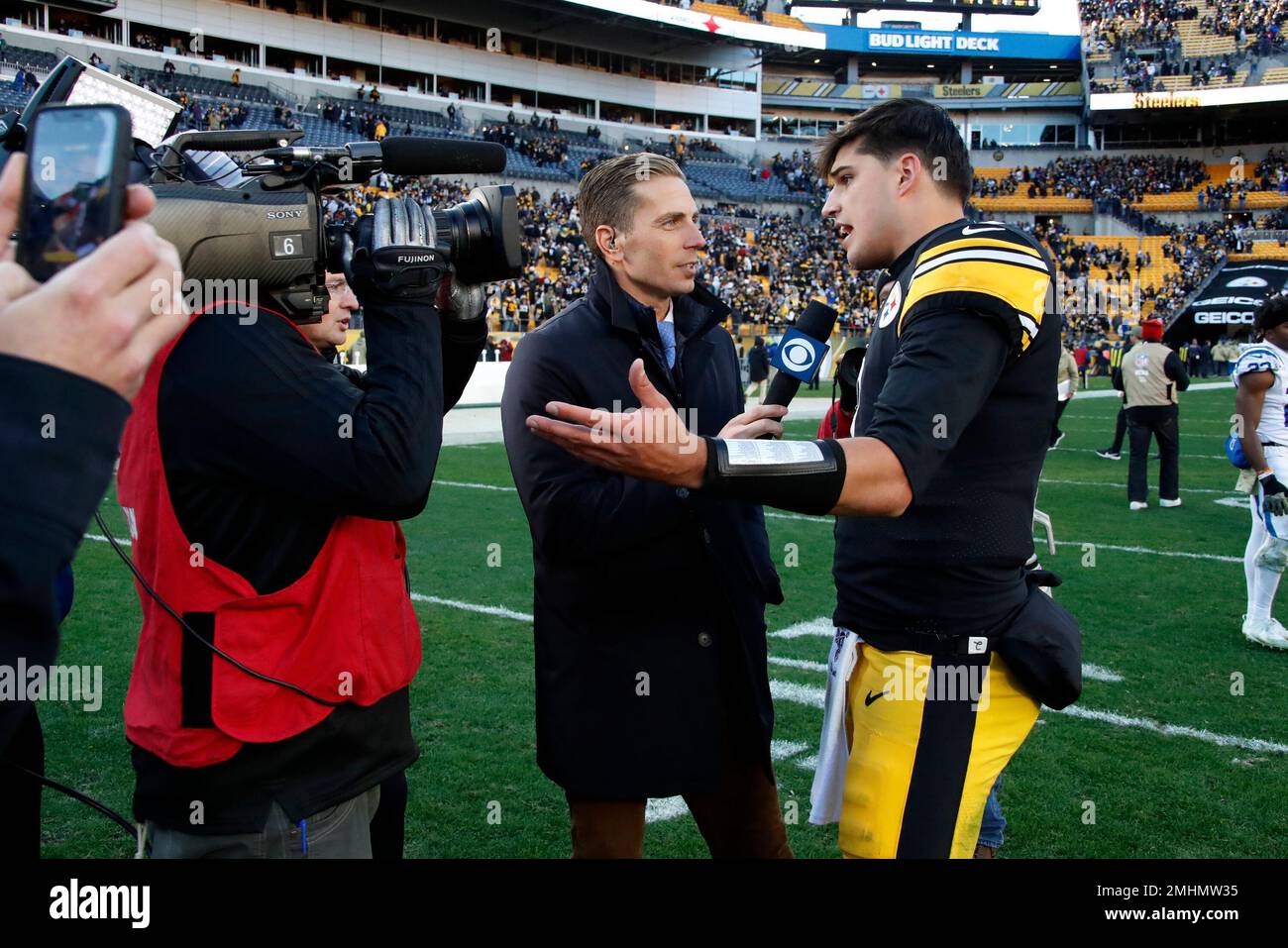 Pittsburgh Steelers quarterback Mason Rudolph, right, is interviewed on the  field by an ESPN crew following a 26-24 win over the Indianapolis Colts in  an NFL football game in Pittsburgh, Sunday, Nov.