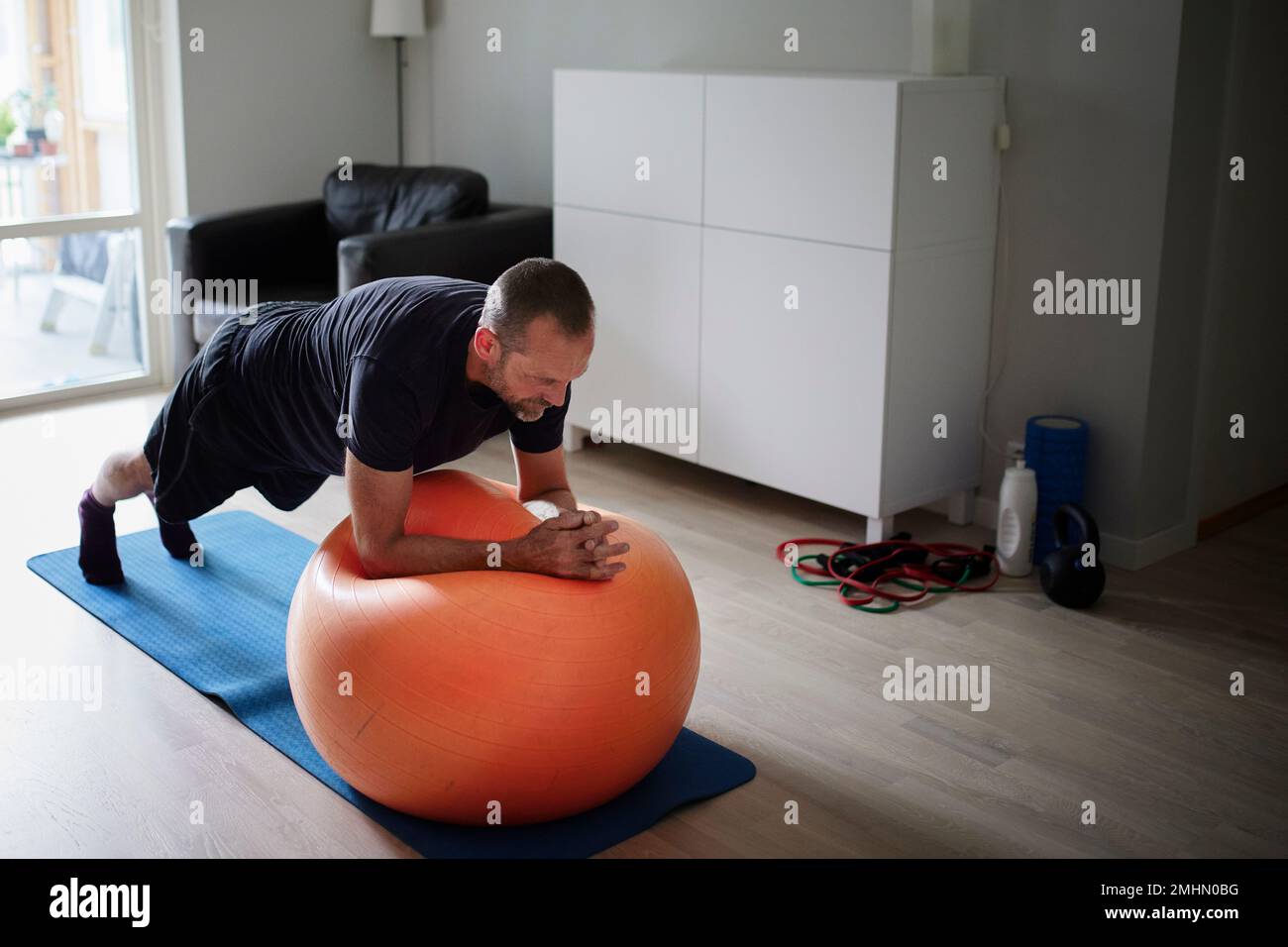 Man training at home Stock Photo