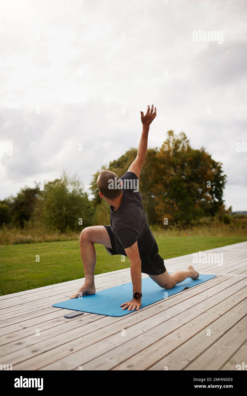 Man training at patio Stock Photo