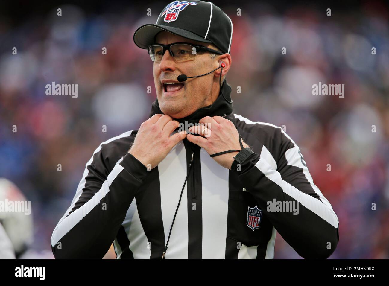 Game officials pose on the field before an NFL football game between the Minnesota  Vikings and the Chicago Bears, Sunday, Dec. 30, 2018, in Minneapolis. Shown  are replay assistant Willie Vizoso, from