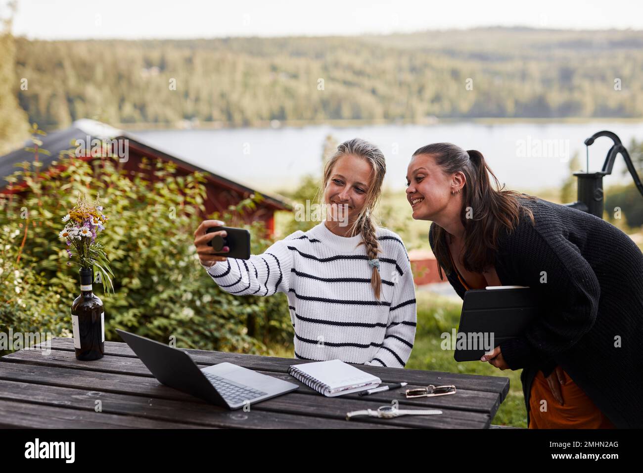 Smiling women taking selfie Stock Photo