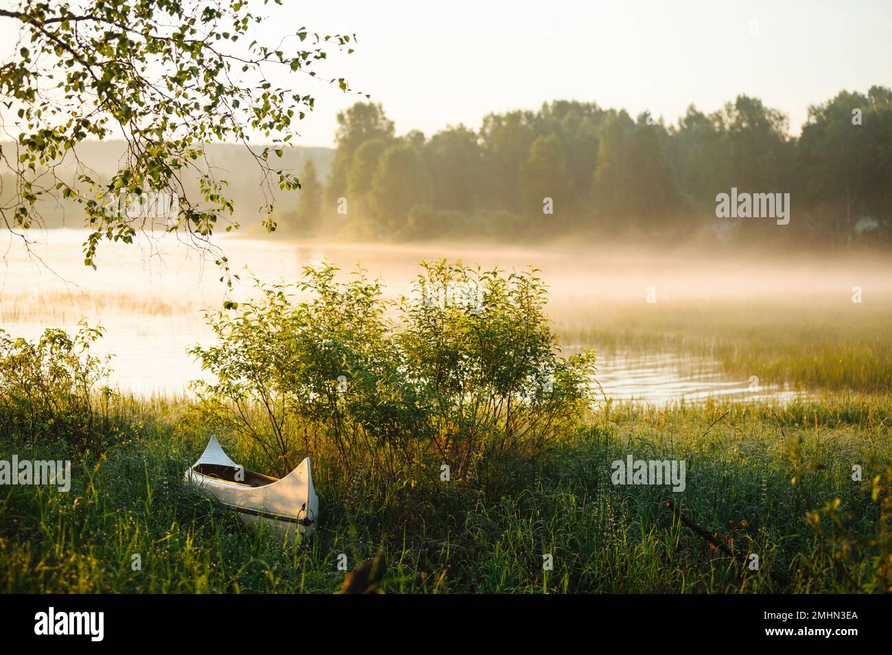 Canoe fog lake mist hi-res stock photography and images - Alamy