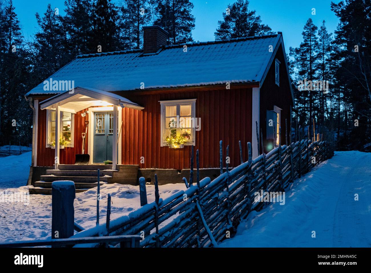 Exterior of snowy Falun red house Stock Photo Alamy