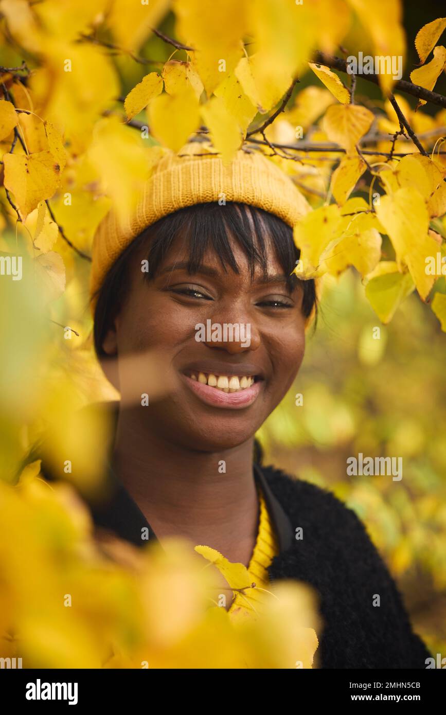 Smiling woman looking at camera Stock Photo
