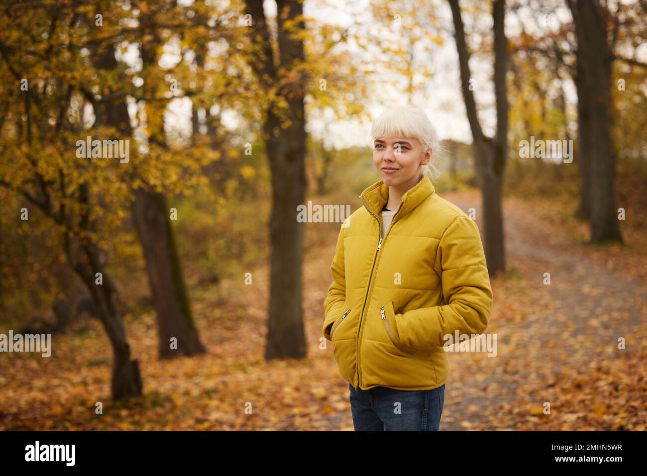 Smiling woman looking away Stock Photo