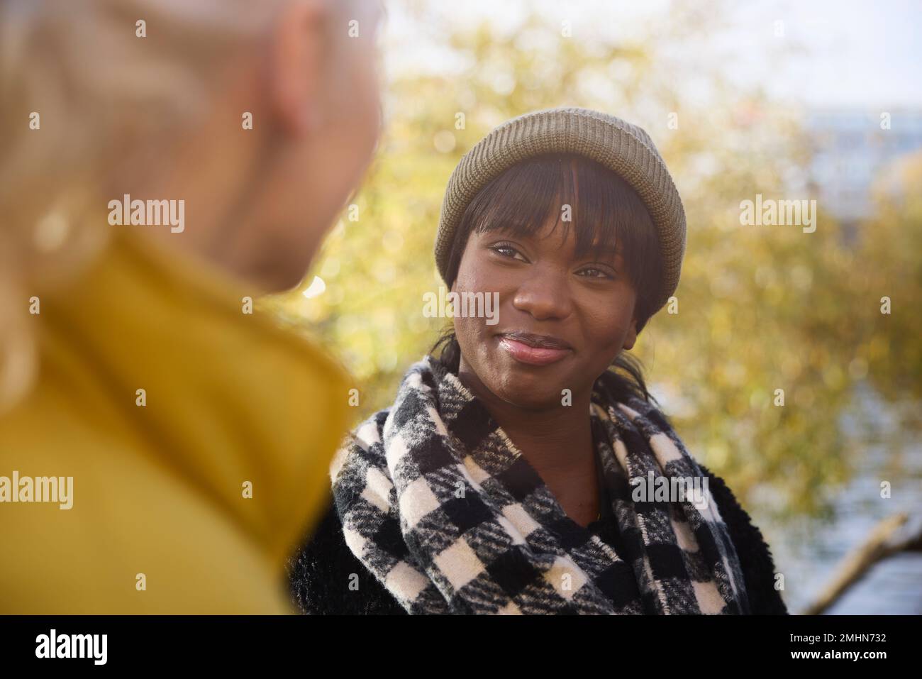 Smiling woman looking away Stock Photo