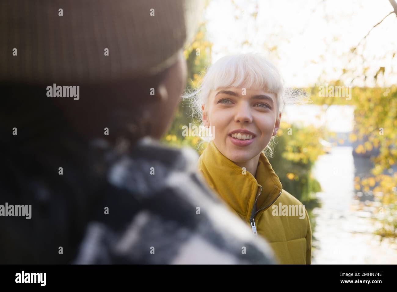 Smiling woman looking away Stock Photo