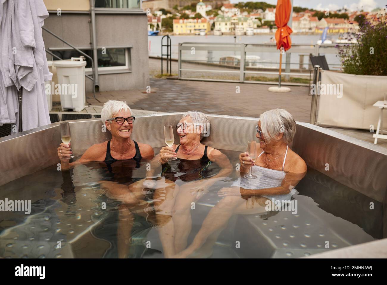 Senior women relaxing in hot tub Stock Photo Alamy