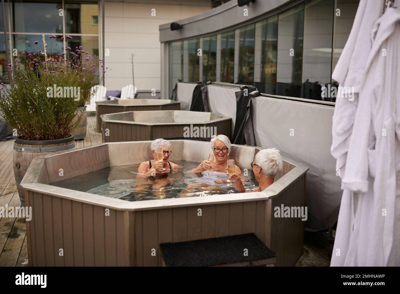 Senior women relaxing in hot tub Stock Photo Alamy