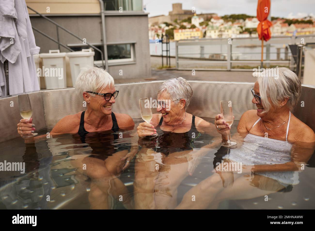 Senior women relaxing in hot tub Stock Photo Alamy