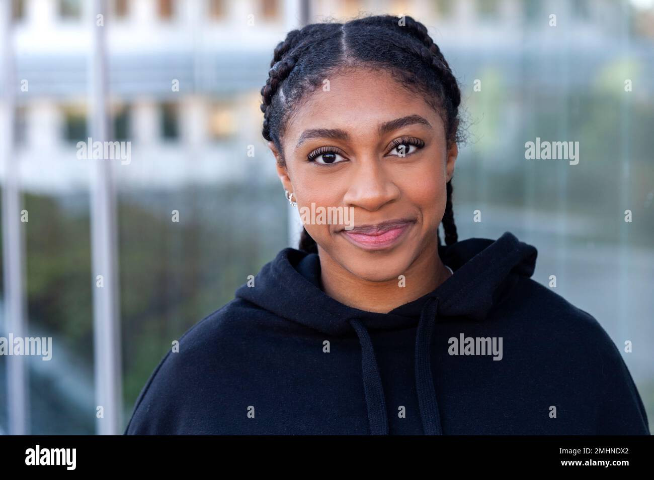 Portrait of beautiful woman with braided hair Stock Photo - Alamy