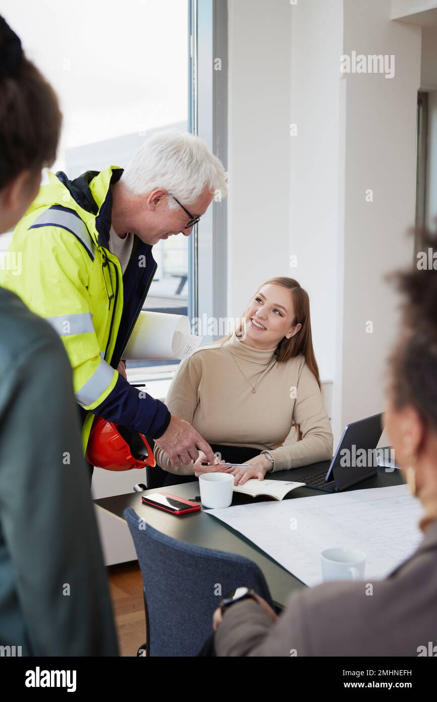 Architects having meeting in office Stock Photo
