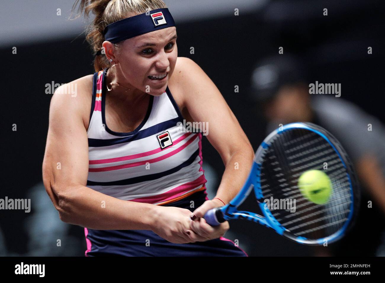 Sofia Kenin of the United States hits a return shot against Elina